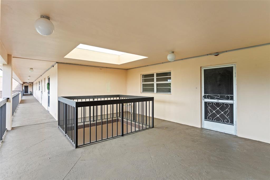 6300 Northwest 2nd Avenue, Unit 405 Boca Raton, FL 33487 - Photo 2 of 37 a view of livingroom with furniture and windows