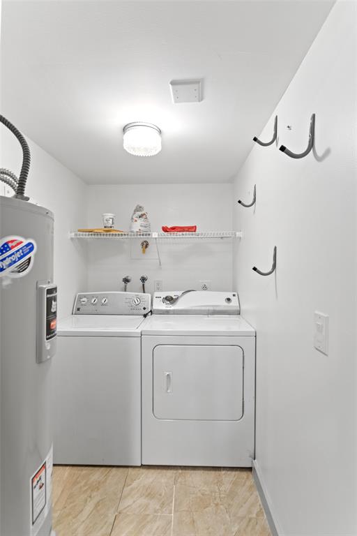 6300 Northwest 2nd Avenue, Unit 405 Boca Raton, FL 33487 - Photo 32 of 37 a utility room with dryer and washer