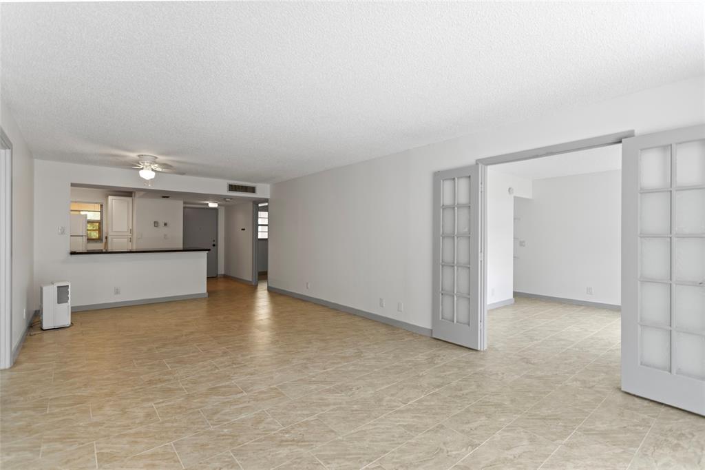 6300 Northwest 2nd Avenue, Unit 405 Boca Raton, FL 33487 - Photo 8 of 37 an empty room with a bathroom