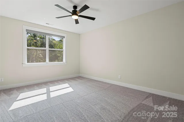 a bathroom with a double vanity sink a mirror and a bathtub