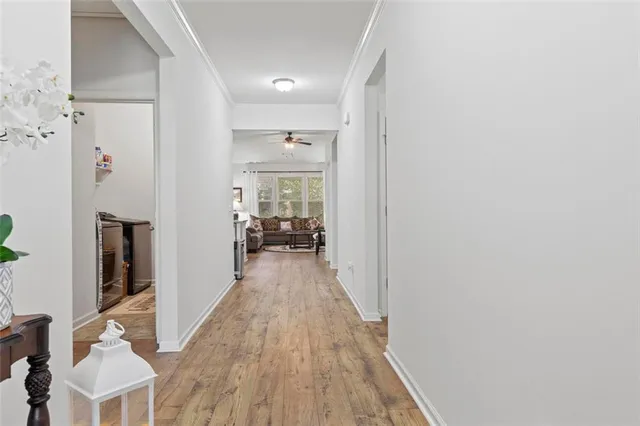 a view of a bedroom from a hallway