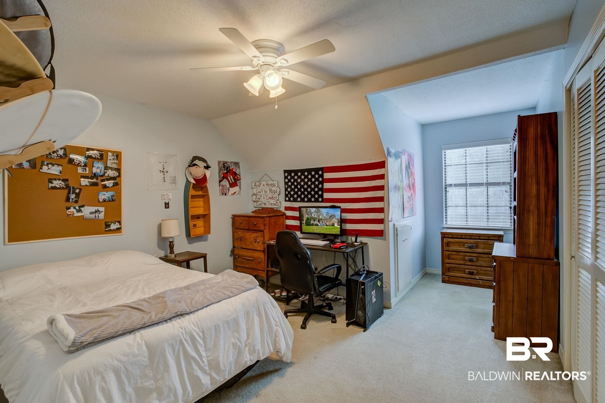 8 Soldiers Route Spanish Fort, AL 36527 - Photo 25 of 42 Bedroom with light colored carpet, vaulted ceiling, a ceiling fan, and a closet