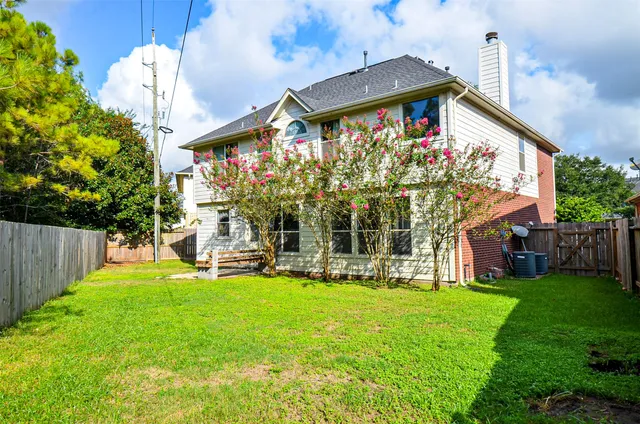 a front view of house with yard