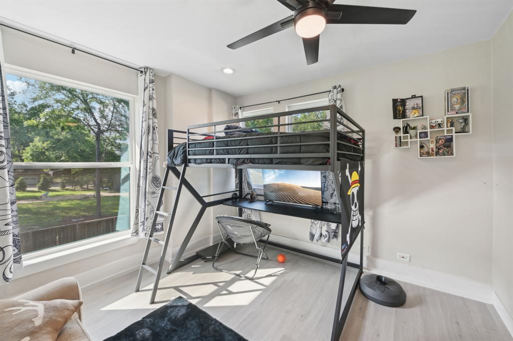 702 Griffith Avenue Terrell, TX 75160 - Photo 32 of 40 a room with gym equipment and large mirror