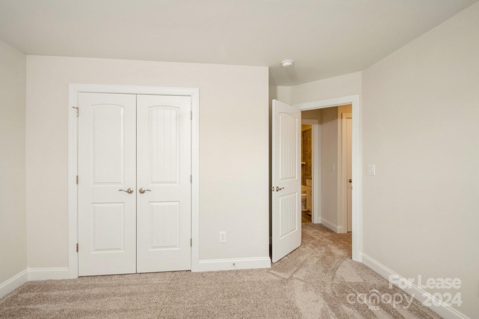 131 Brixham Loop Troutman, NC 28166 - Photo 19 of 26 a view of an empty room
