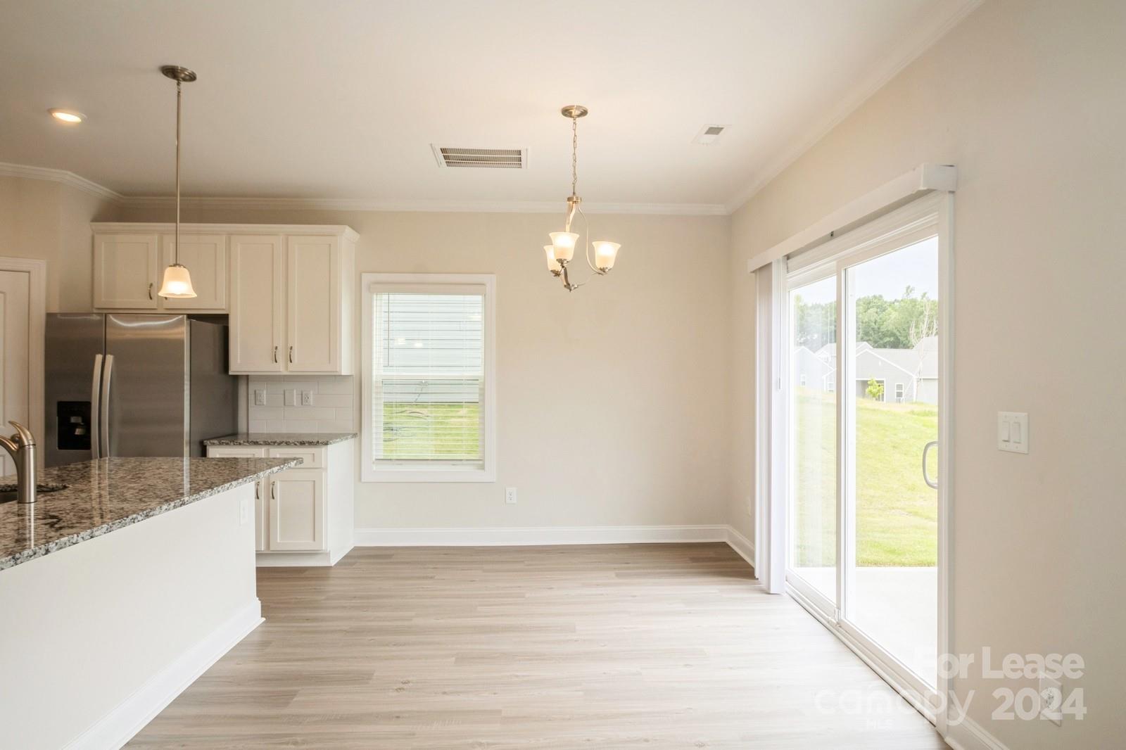 131 Brixham Loop Troutman, NC 28166 - Photo 10 of 26 a view of a kitchen and a sink