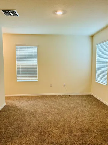 an empty room with an entryway