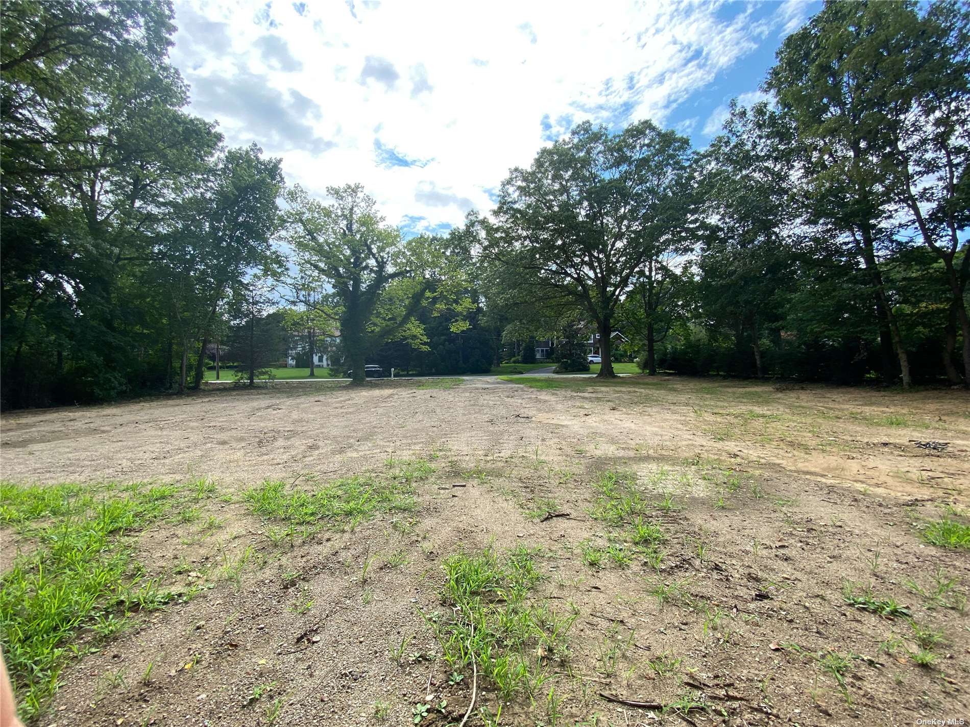 18 Pineridge Road Greenvale, NY 11548 - Photo 1 of 1 a view of a green field with trees in the background