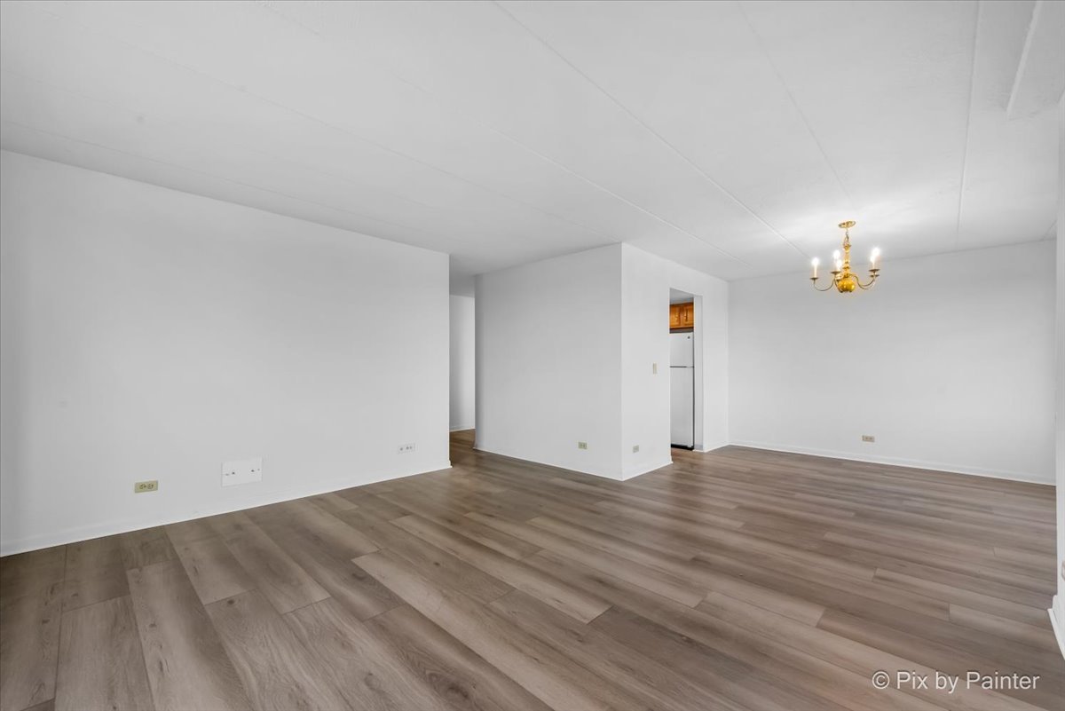 1 Renaissance Place, Unit 1017 Palatine, IL 60067 - Photo 16 of 30 a view of empty room with wooden floor