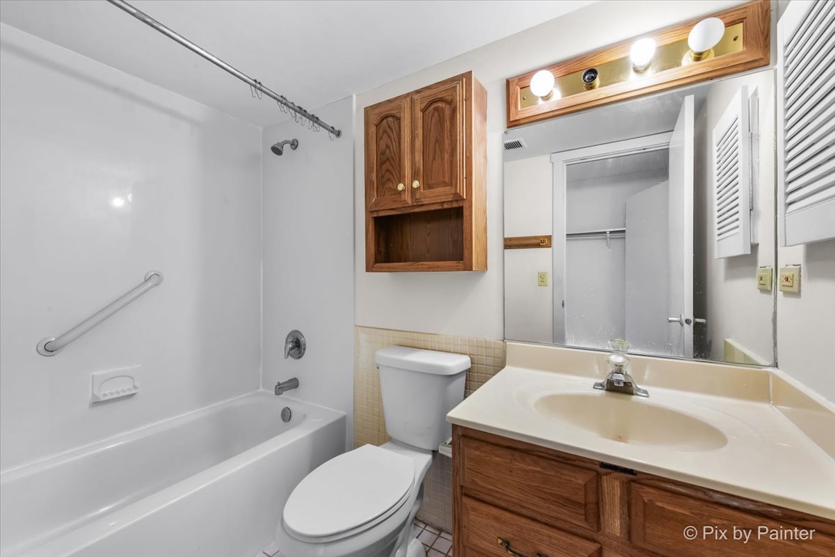 1 Renaissance Place, Unit 1017 Palatine, IL 60067 - Photo 19 of 30 a bathroom with a sink toilet and shower
