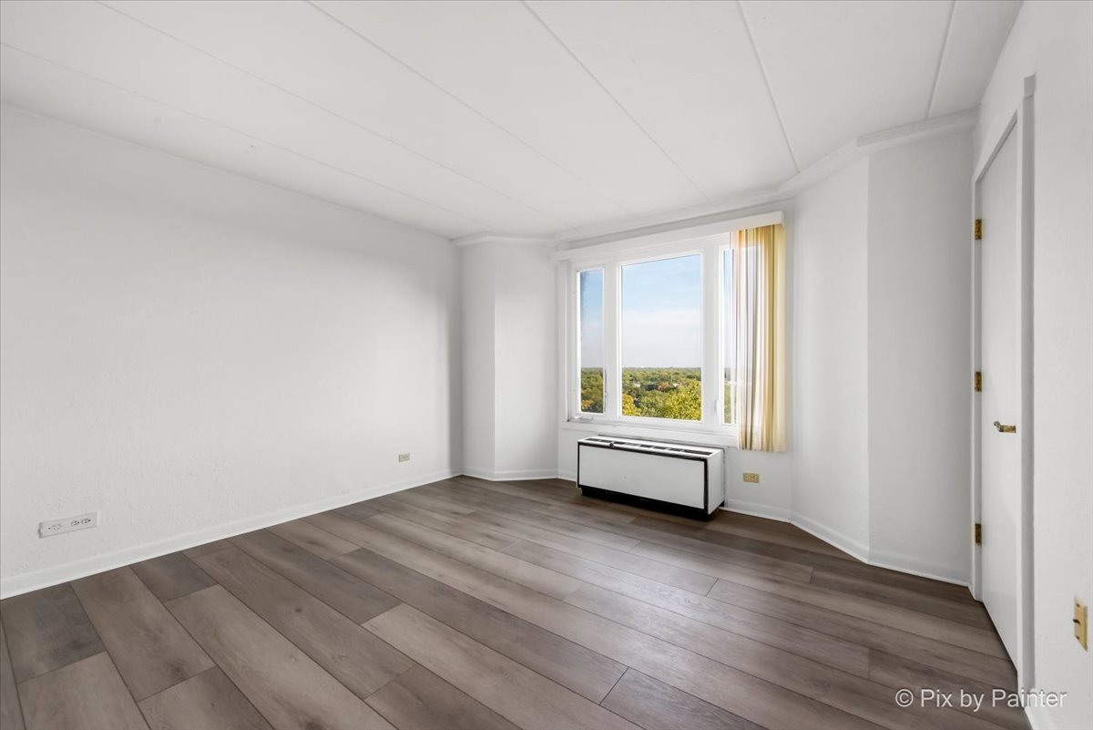 1 Renaissance Place, Unit 1017 Palatine, IL 60067 - Photo 20 of 30 a view of empty room with wooden floor and window