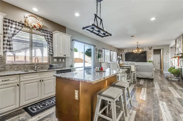 a very nice looking kitchen with a large window