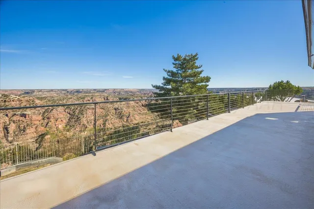 a view of a house with a tree
