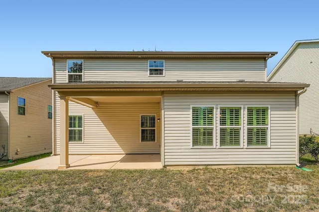 a view of house with deck