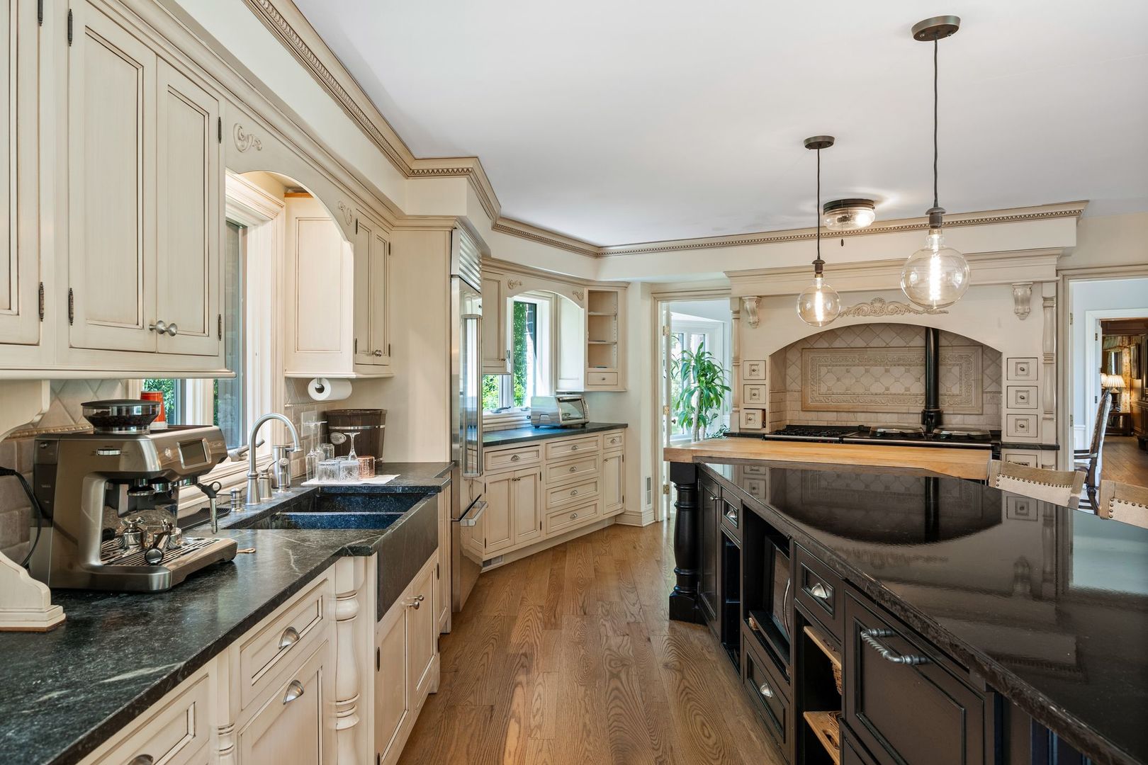 541 Merri Oaks Road Barrington Hills, IL 60010 - Photo 15 of 60 a kitchen with sink refrigerator and stove