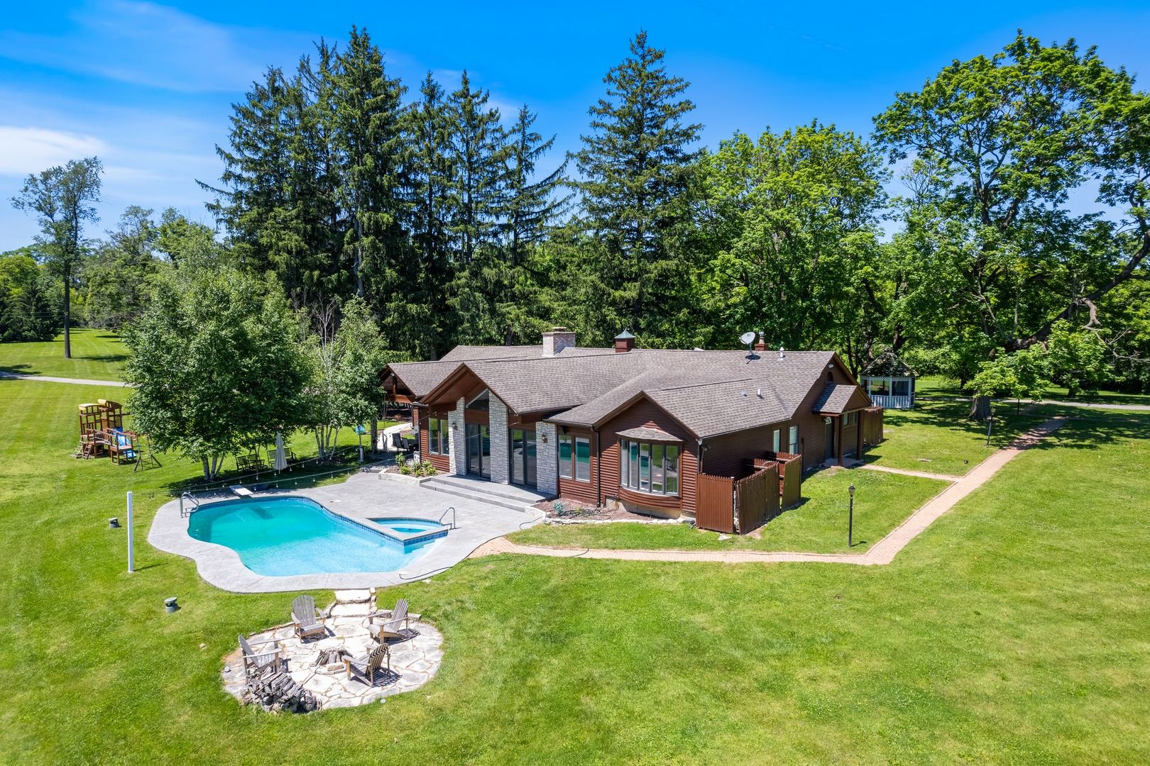 541 Merri Oaks Road Barrington Hills, IL 60010 - Photo 58 of 60 a aerial view of a house with swimming pool and big yard