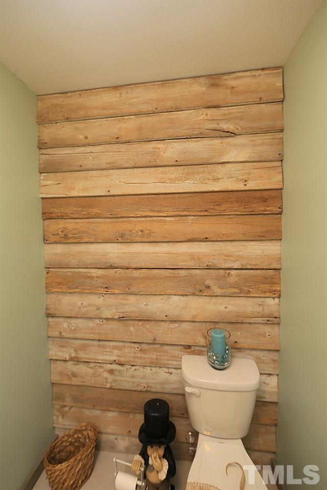 6579 New Market Way, Unit 6579 Raleigh, NC 27615 - Photo 12 of 22 a bathroom with a toilet and a shower