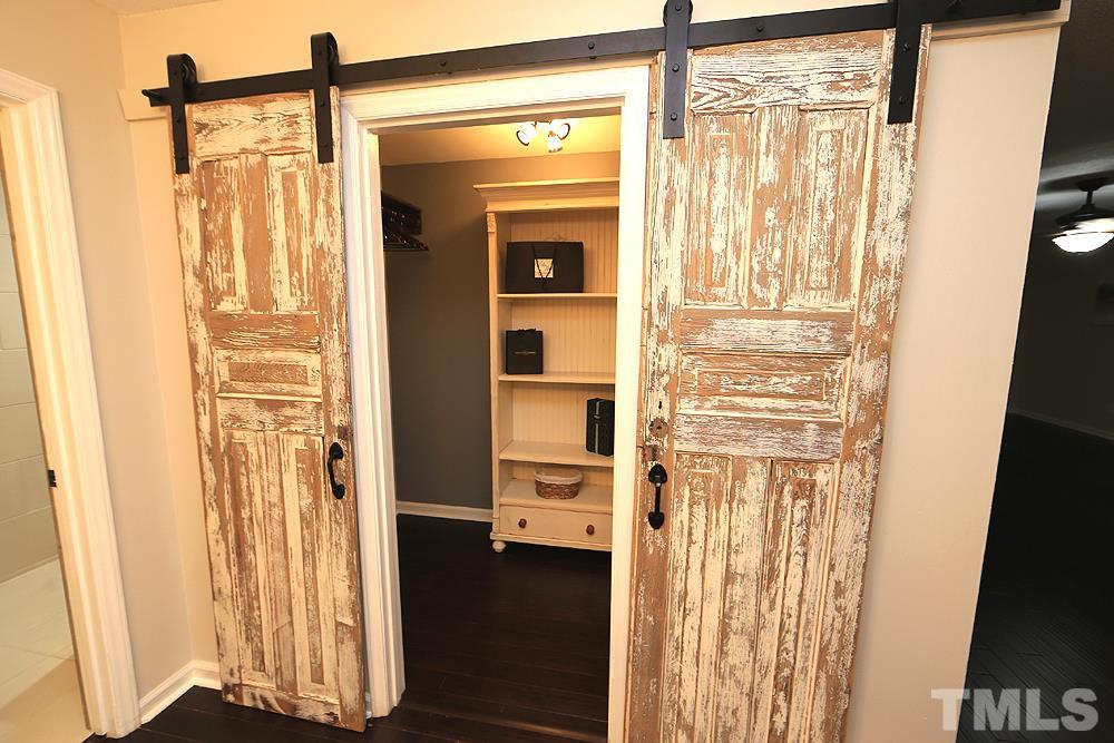 6579 New Market Way, Unit 6579 Raleigh, NC 27615 - Photo 10 of 22 a view of a bathroom with a door