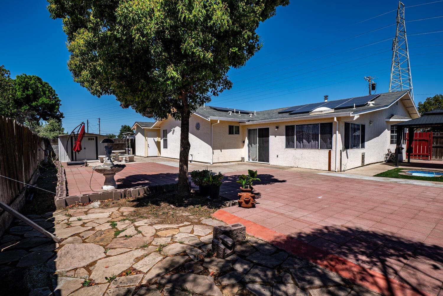 802 West Center Street Manteca, CA 95337 - Photo 24 of 29 a front view of a house with a yard