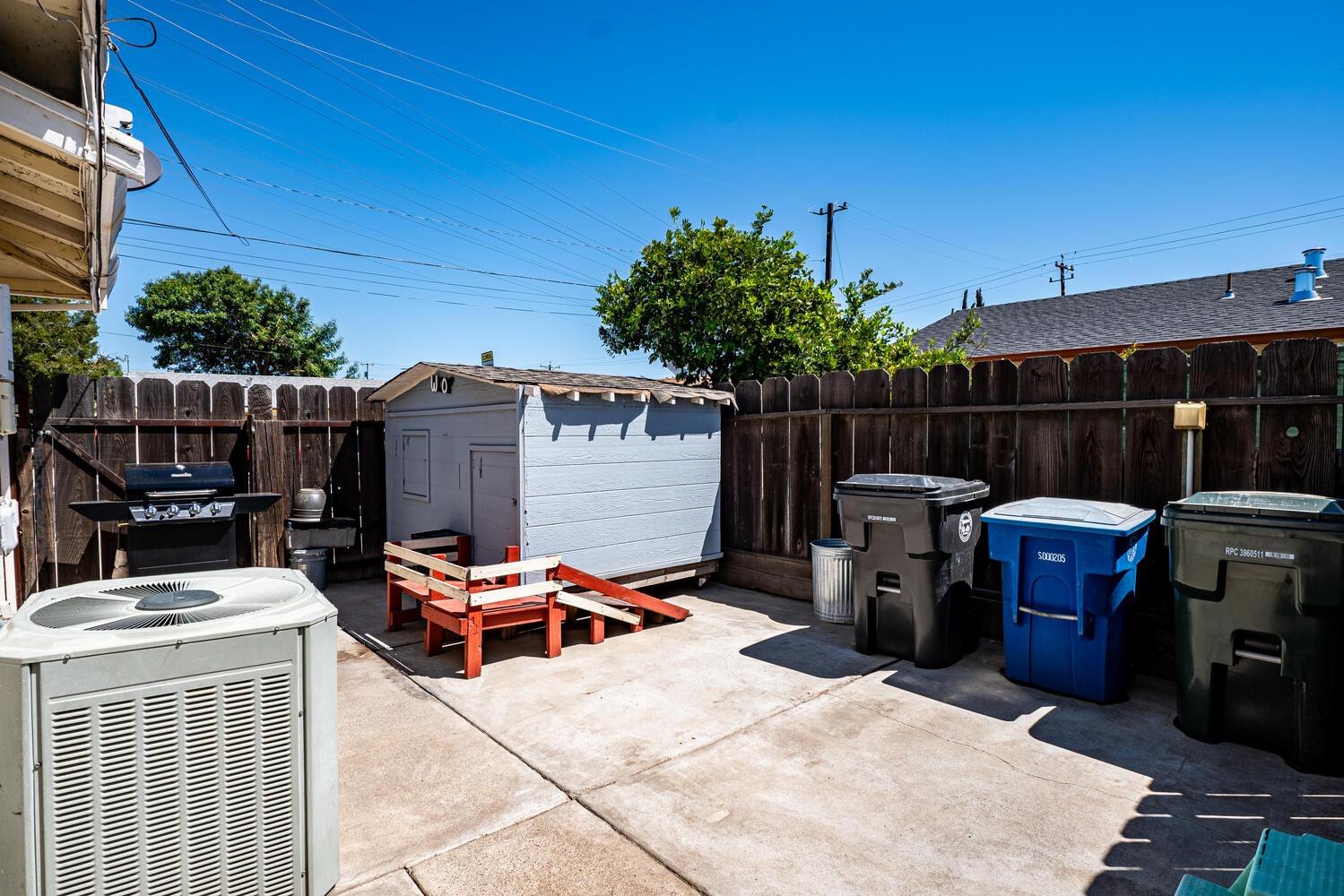 802 West Center Street Manteca, CA 95337 - Photo 27 of 29 a view of a chairs and table in the patio
