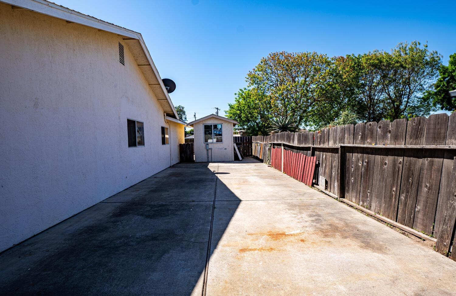 802 West Center Street Manteca, CA 95337 - Photo 6 of 29 a view of balcony with wooden floor and fence