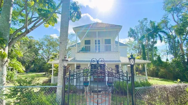 a view of backyard with green space