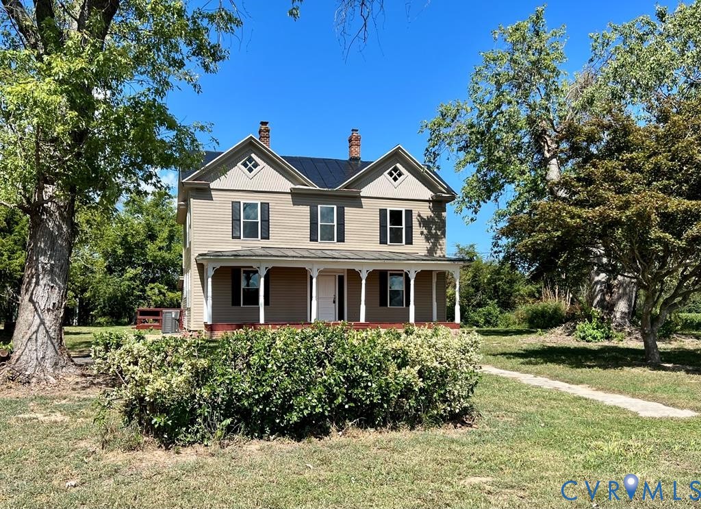 40 Coan Wharf Road Heathsville, VA 22473 - Photo 2 of 28 a front view of a house with a yard