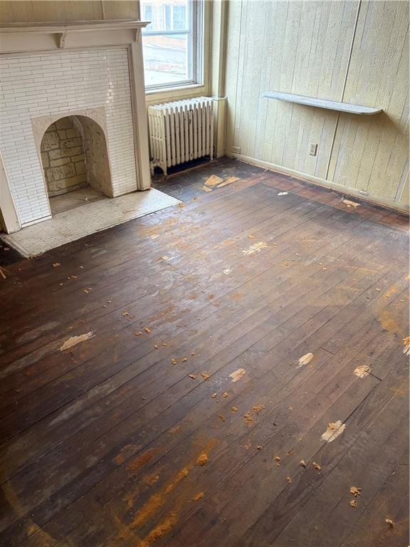 1008 Collier Street Pittsburgh, PA 15208 - Photo 4 of 10 a view of an empty room with a fireplace and a window