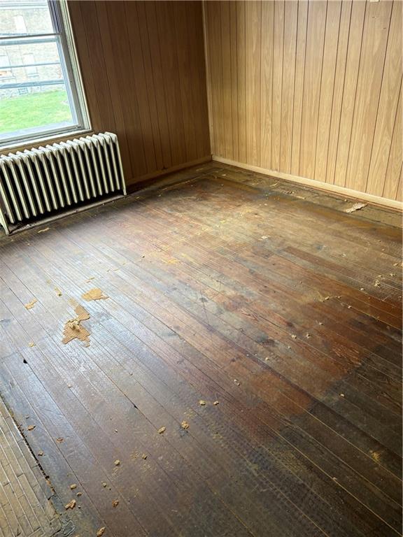1008 Collier Street Pittsburgh, PA 15208 - Photo 5 of 10 an empty room with a wooden floor