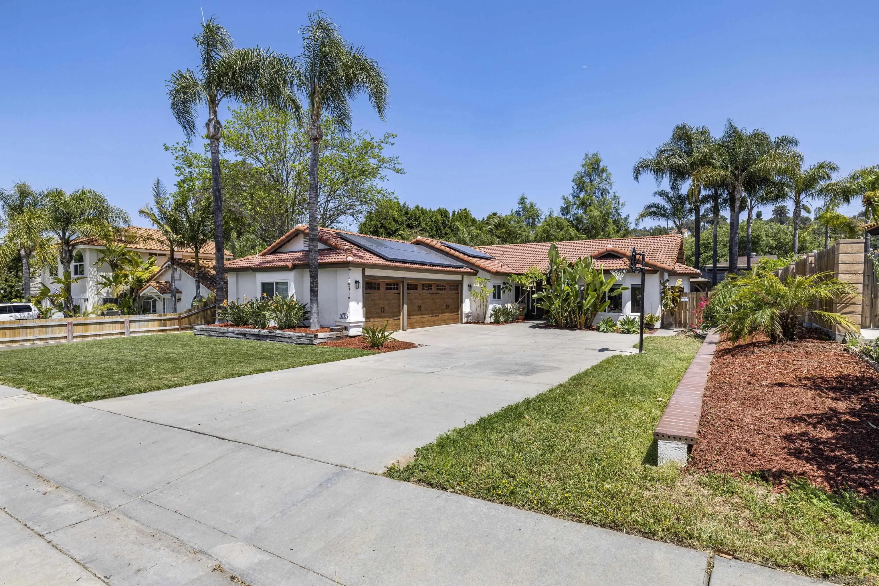 3127 Rio Way Spring Valley, CA 91977 - Photo 1 of 45 a front view of house with yard and green space
