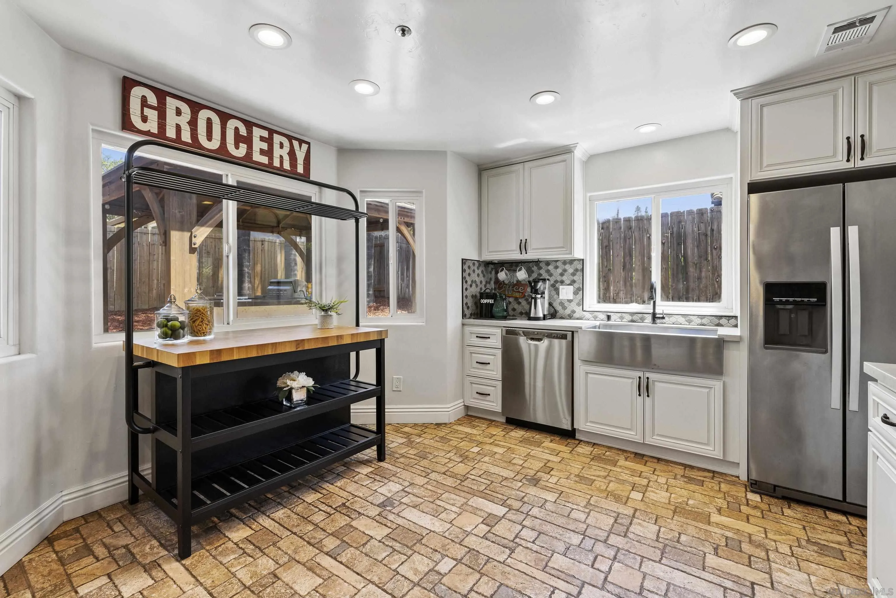 3127 Rio Way Spring Valley, CA 91977 - Photo 17 of 45 a kitchen with stainless steel appliances a refrigerator and a stove top oven