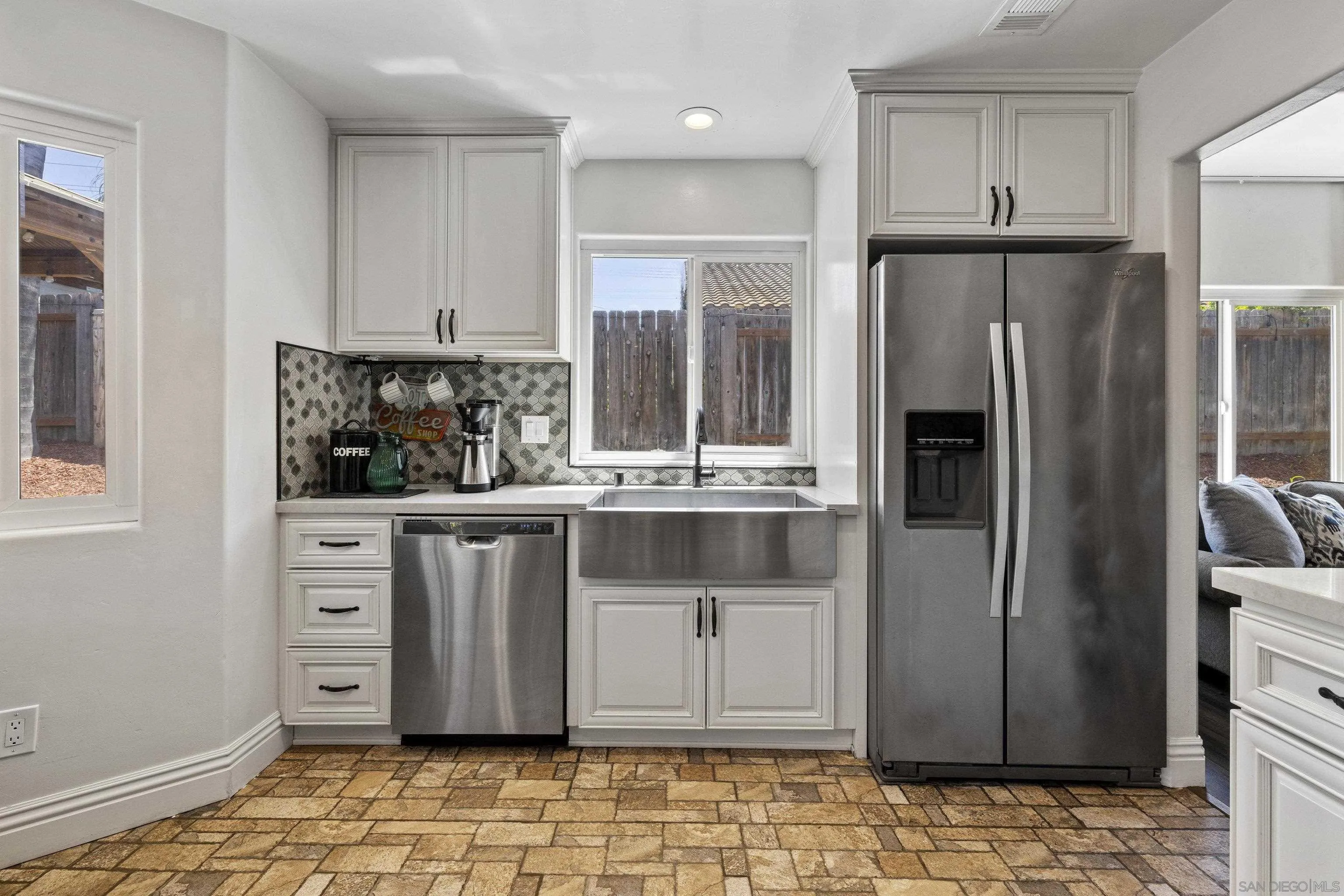 3127 Rio Way Spring Valley, CA 91977 - Photo 20 of 45 a kitchen with stainless steel appliances a refrigerator and a stove