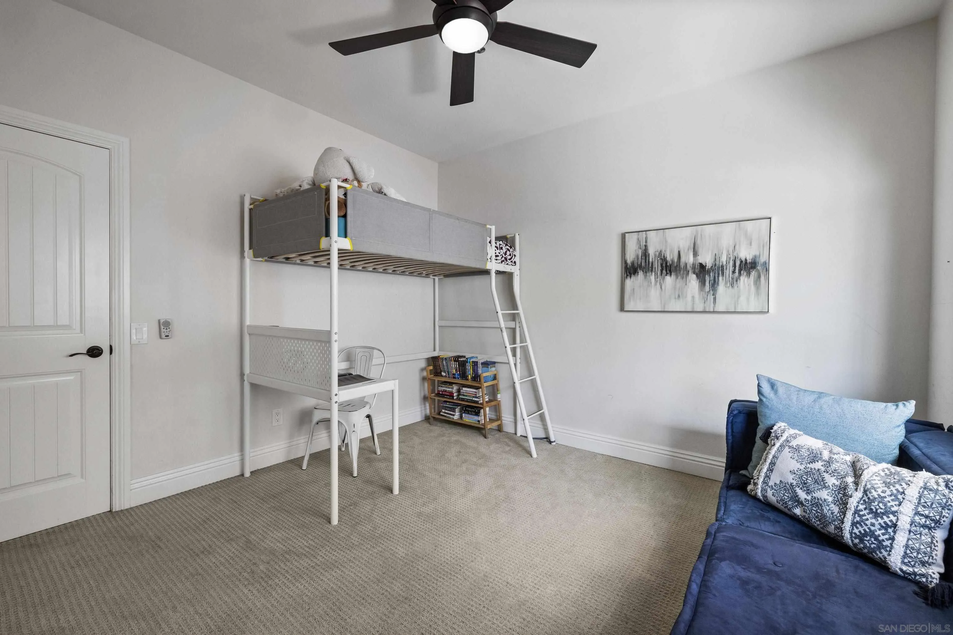 3127 Rio Way Spring Valley, CA 91977 - Photo 31 of 45 a living room with furniture and a ceiling fan
