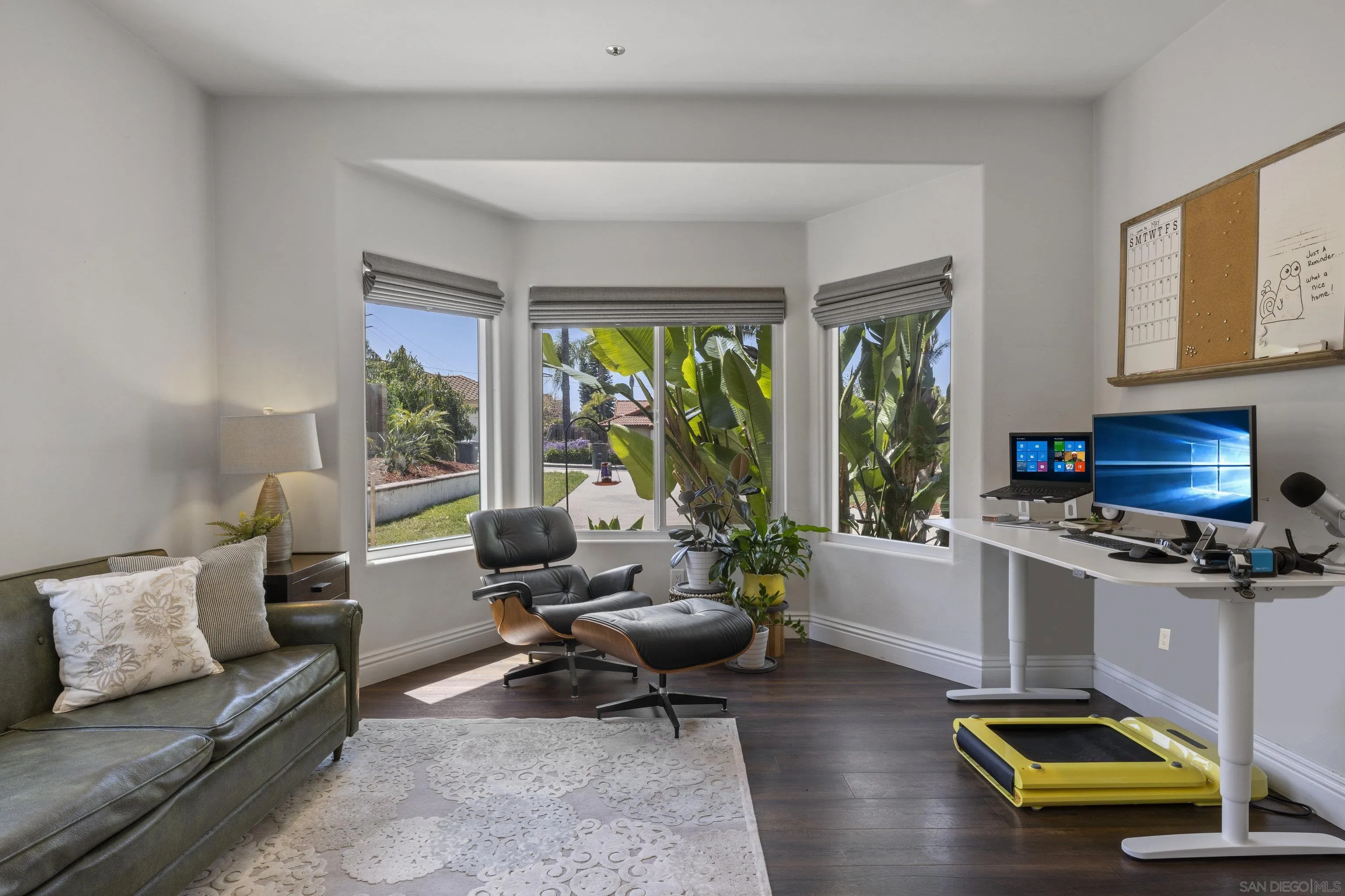 3127 Rio Way Spring Valley, CA 91977 - Photo 33 of 45 a living room with furniture and a fireplace