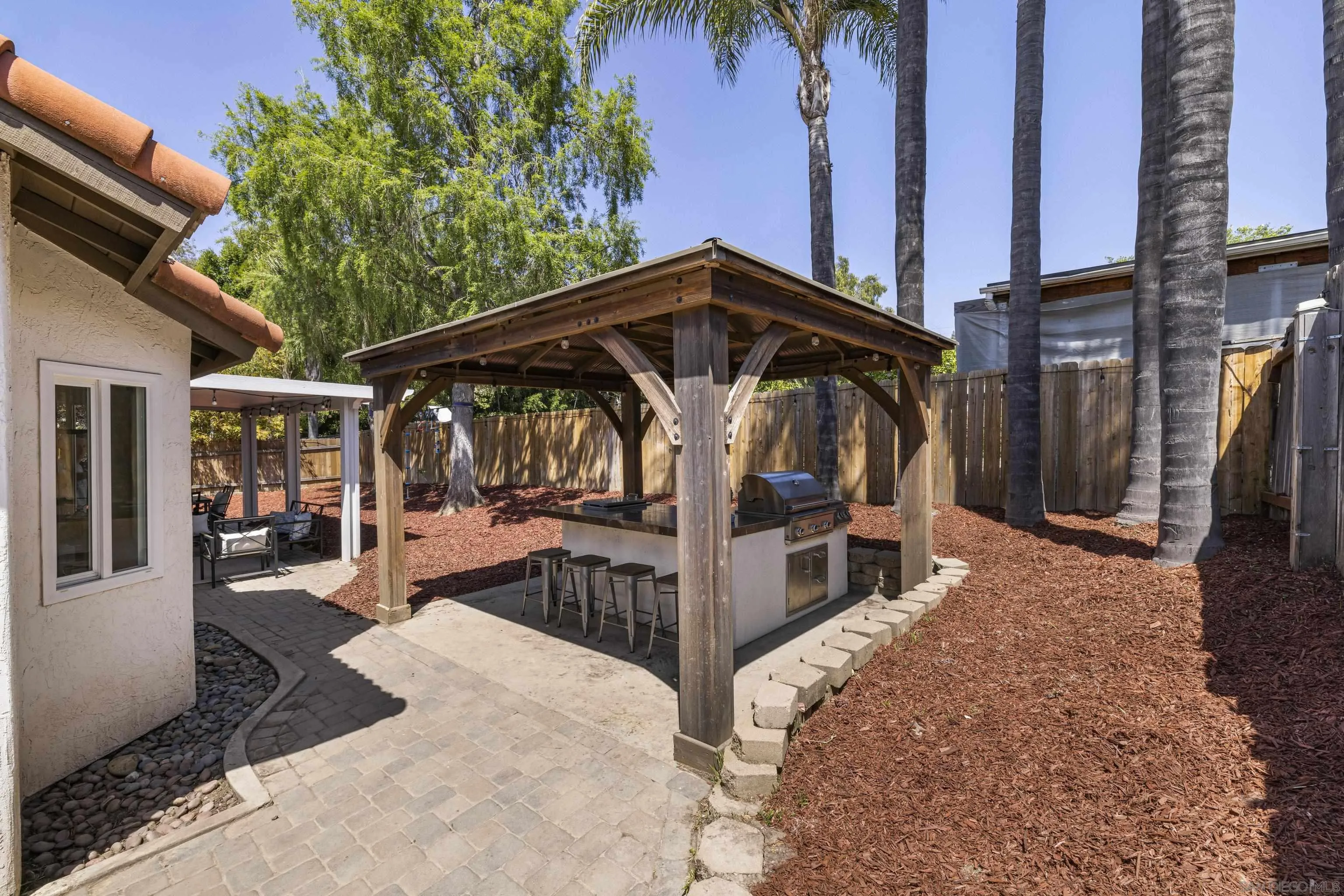 3127 Rio Way Spring Valley, CA 91977 - Photo 34 of 45 a view of a porch with furniture and backyard