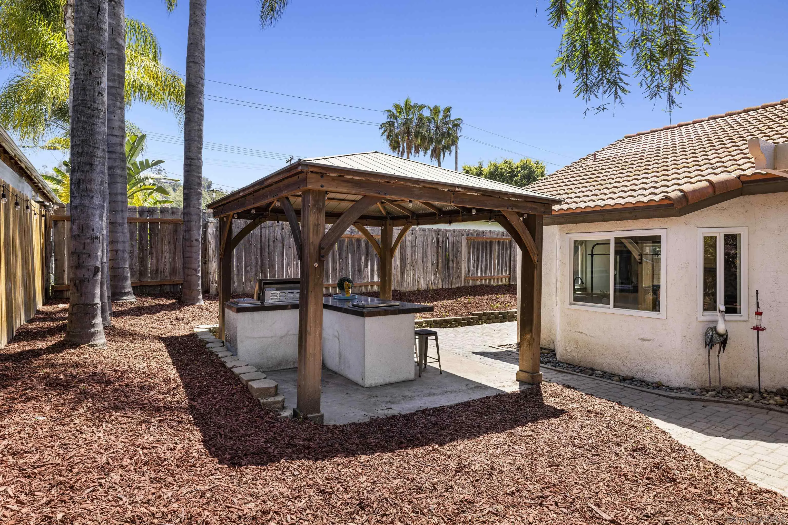 3127 Rio Way Spring Valley, CA 91977 - Photo 36 of 45 a front view of a house with garden