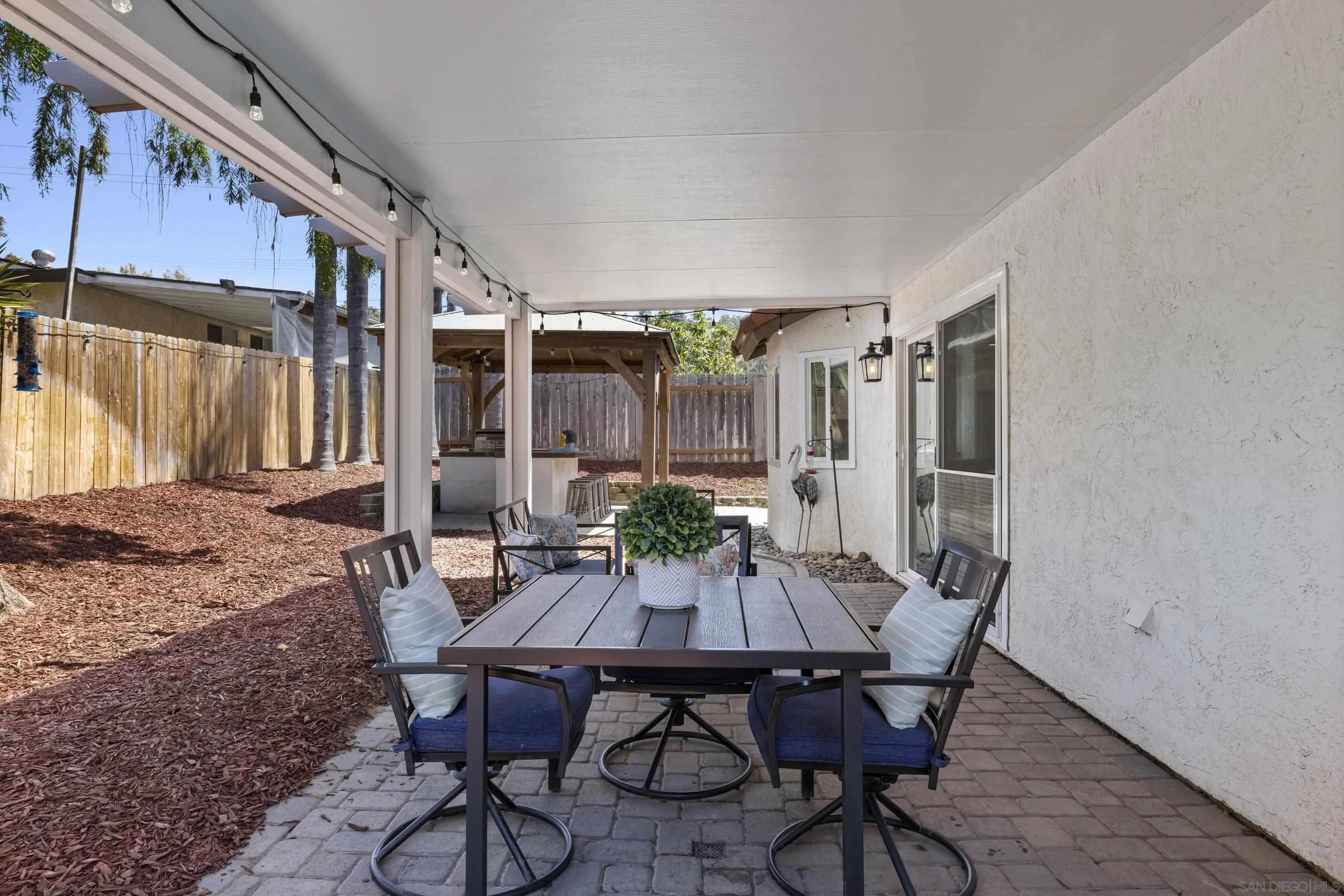 3127 Rio Way Spring Valley, CA 91977 - Photo 39 of 45 a view of a dining room with furniture and wooden floor