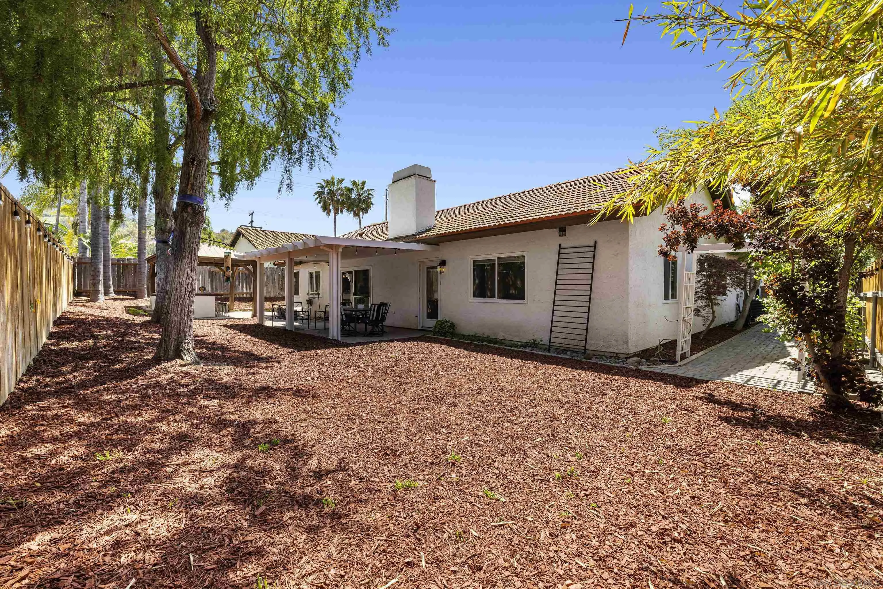 3127 Rio Way Spring Valley, CA 91977 - Photo 41 of 45 a view of a house with a yard