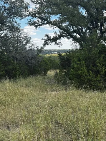a view of a interior of a house with a big yard