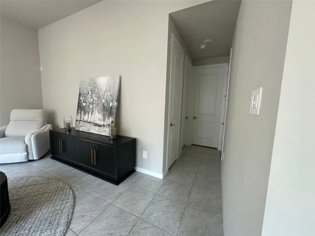 a view of hallway with windows