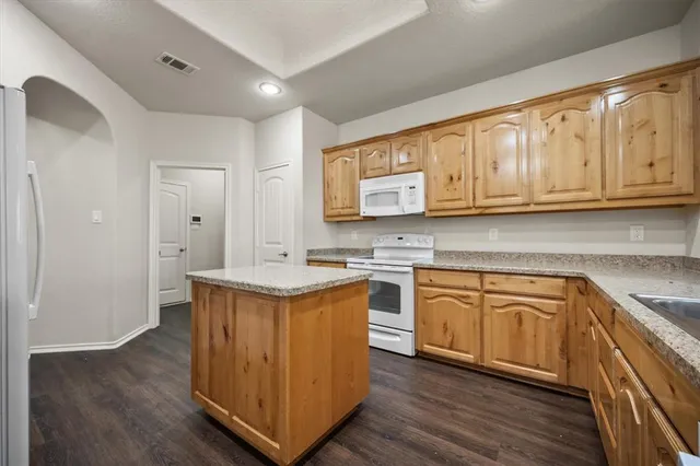 a view of a hallway with closet