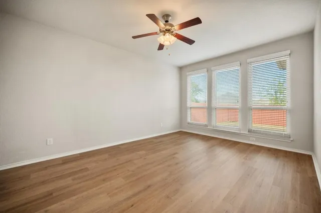 a bathroom with a sink vanity tub and a mirror