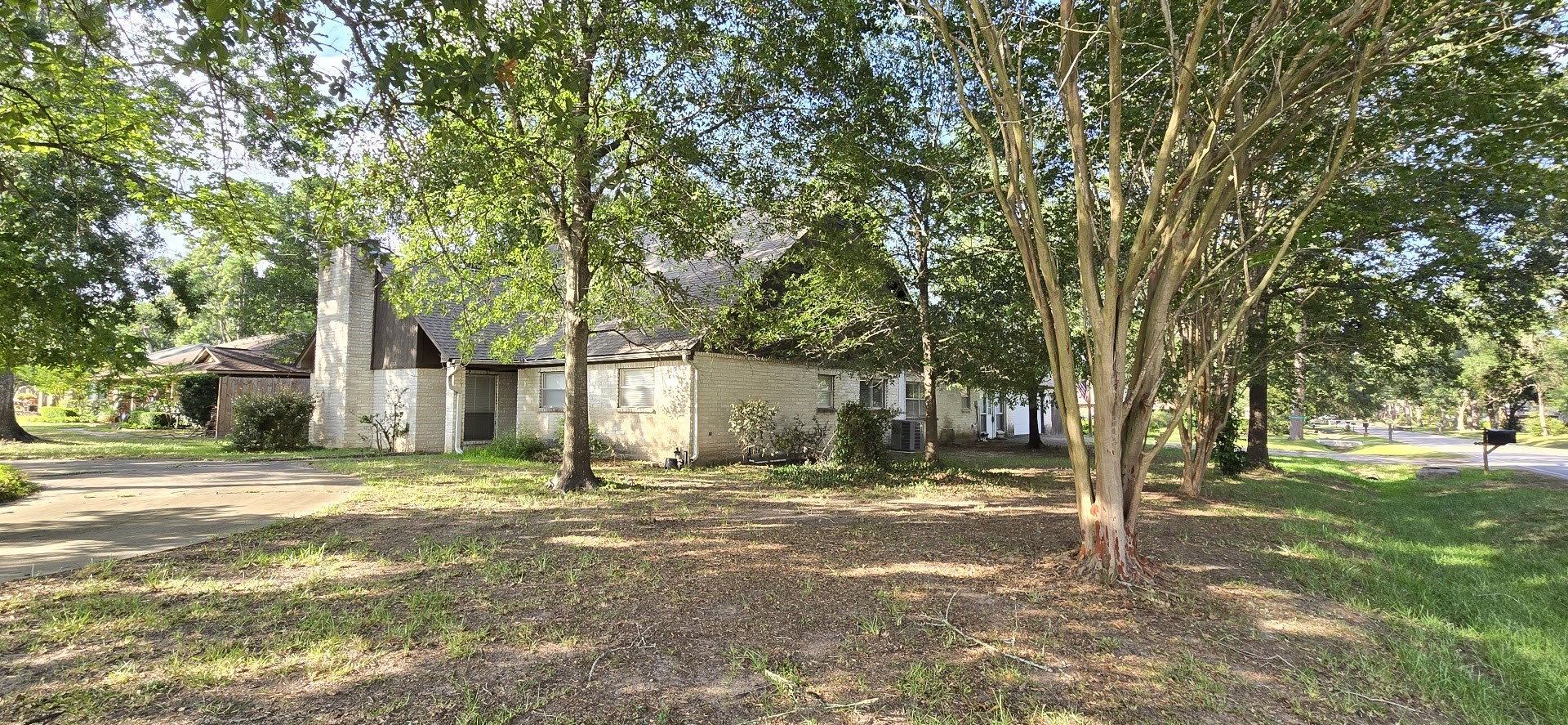 19426 Lockridge Drive Spring, TX 77373 - Photo 3 of 44 a view of a house with a yard and tree s