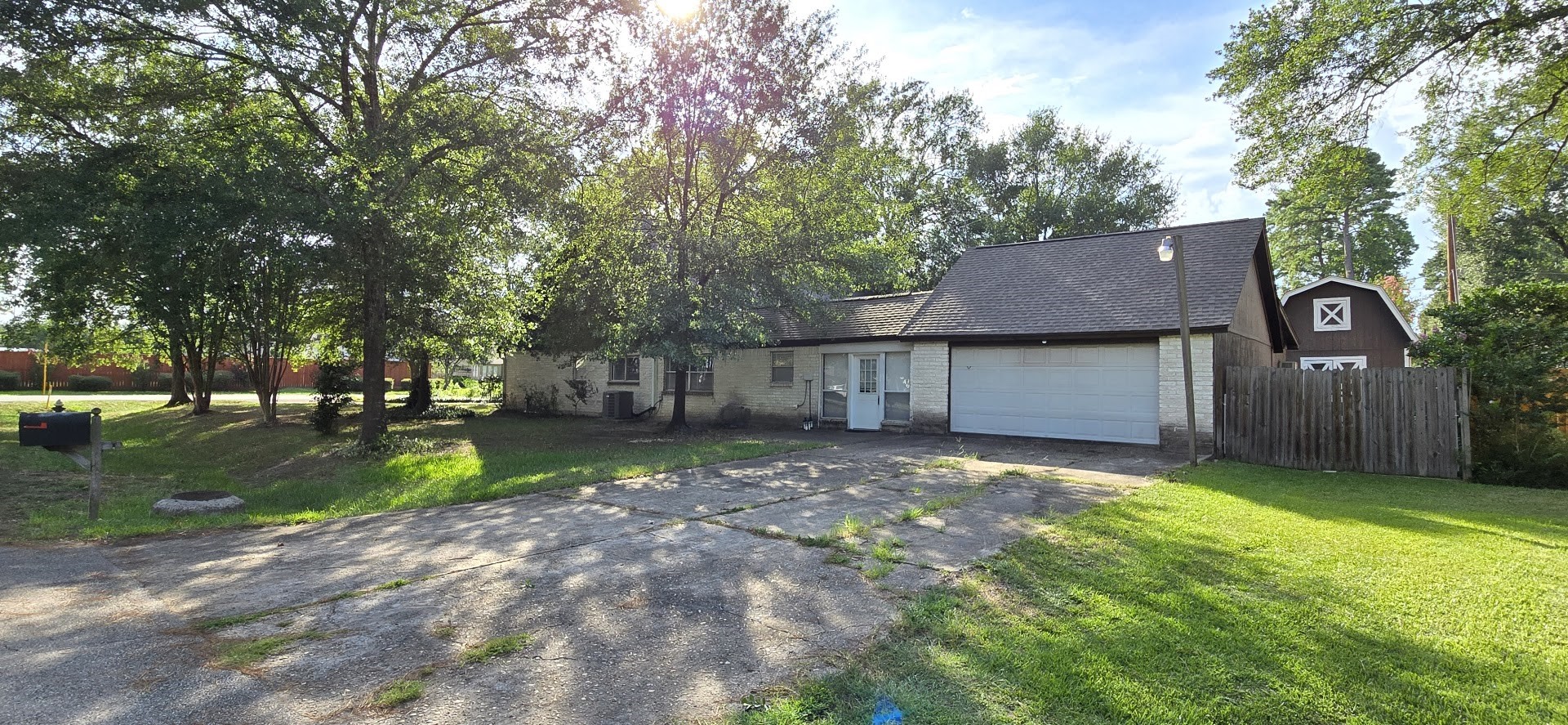 19426 Lockridge Drive Spring, TX 77373 - Photo 32 of 44 a view of a barn in the middle of a yard