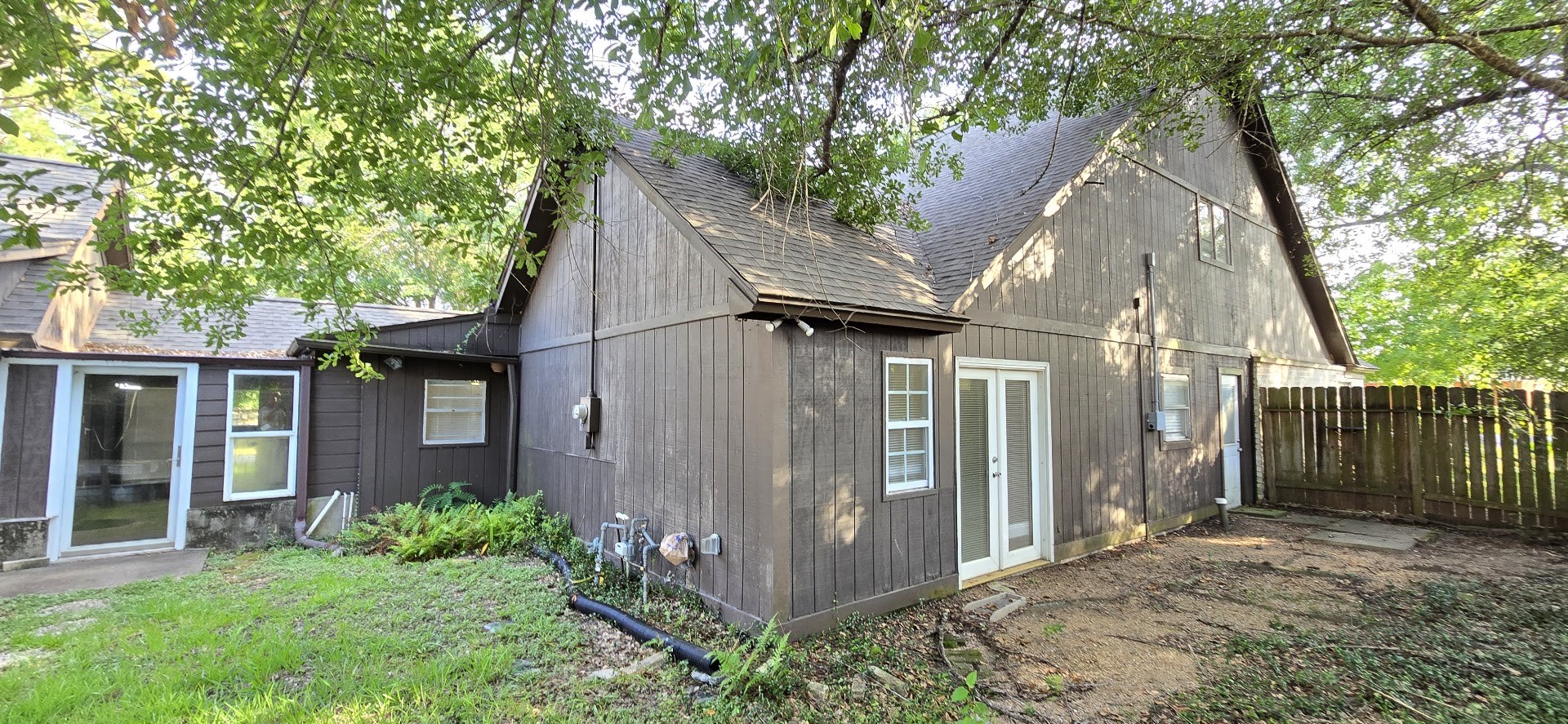 19426 Lockridge Drive Spring, TX 77373 - Photo 33 of 44 a view of a house with a yard and wooden fence