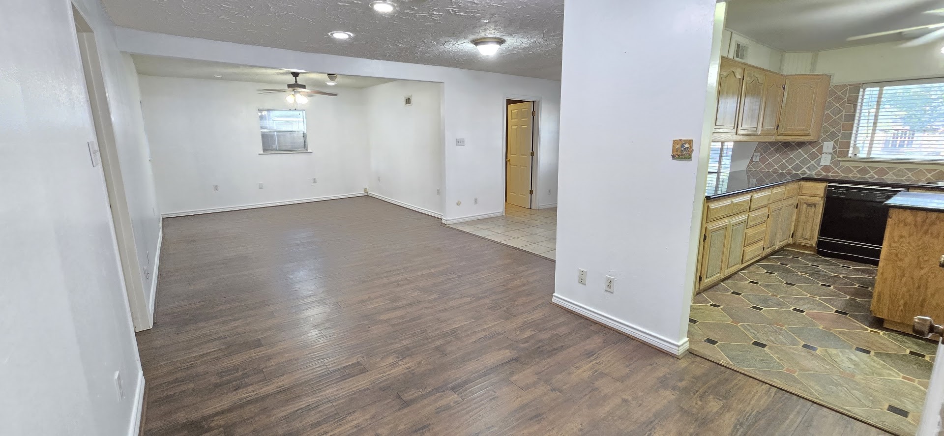 19426 Lockridge Drive Spring, TX 77373 - Photo 6 of 44 a view of a kitchen cabinets and wooden floor