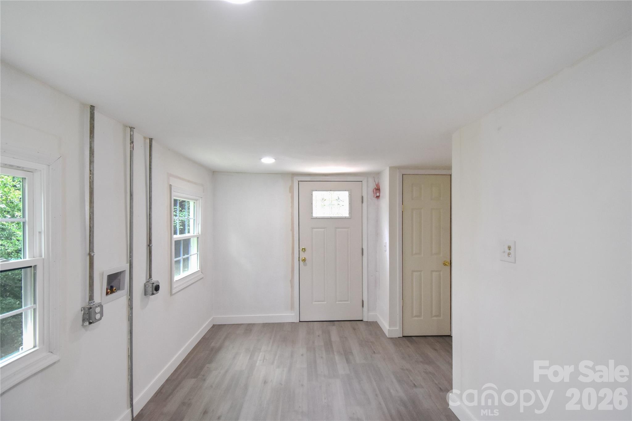 622 Green St Loop Marion, NC 28752 - Photo 9 of 16 a view of a livingroom with wooden floor and window