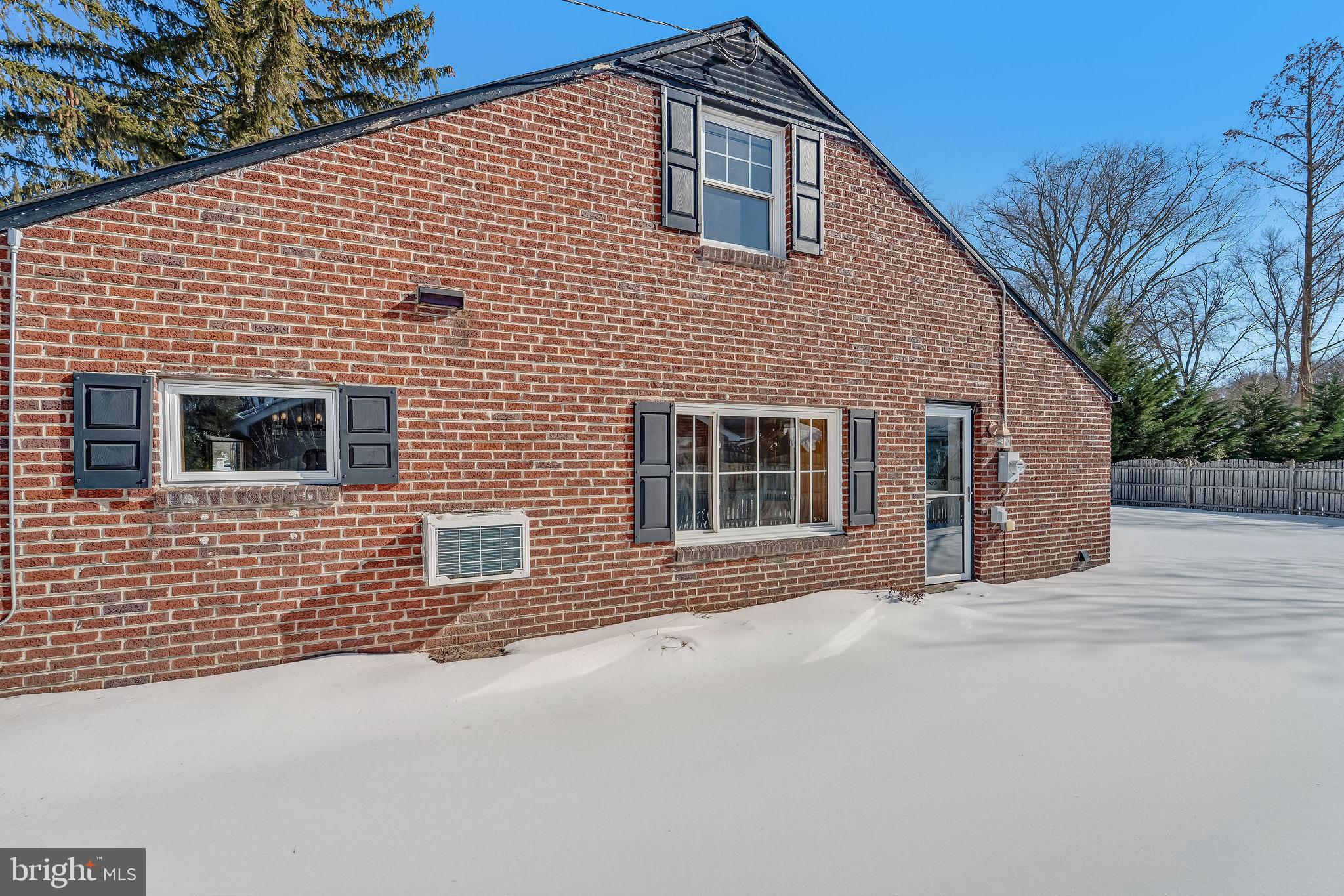 342 Tavistock Boulevard Haddonfield, NJ 08033 - Photo 31 of 32 Charming brick home nestled in winter's embrace.