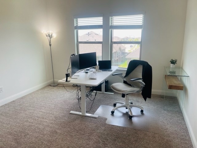 13710 Saxon Cliff Lane Rosharon, TX 77583 - Photo 12 of 20 a view of a workspace with a window