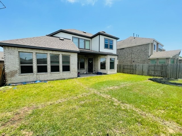 13710 Saxon Cliff Lane Rosharon, TX 77583 - Photo 17 of 20 a front view of a house with a garden
